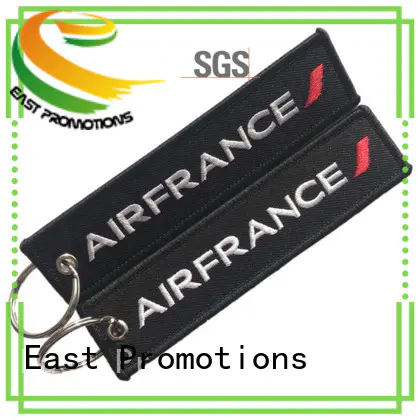 East Promotions remove before flight keychain wholesale for sale